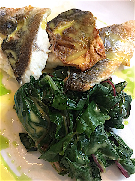 Pan Seared Lavraki with Swiss char and lemon herbed olive oil